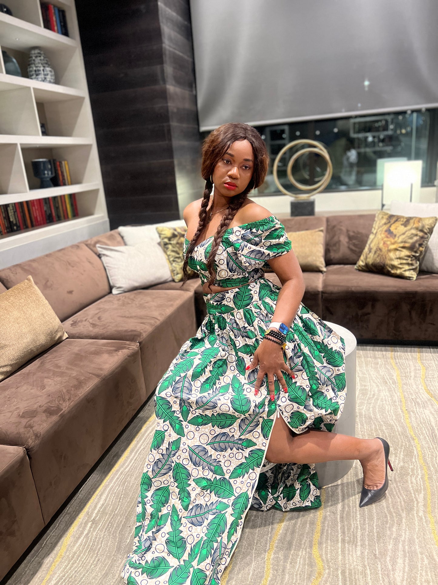 Malayka African printed Maxi Skirt 2 pieces. Skirt with zipper slit on the side, two side pockets and short sleeves crop top. For parties, weddings, birthdays, and major social events.