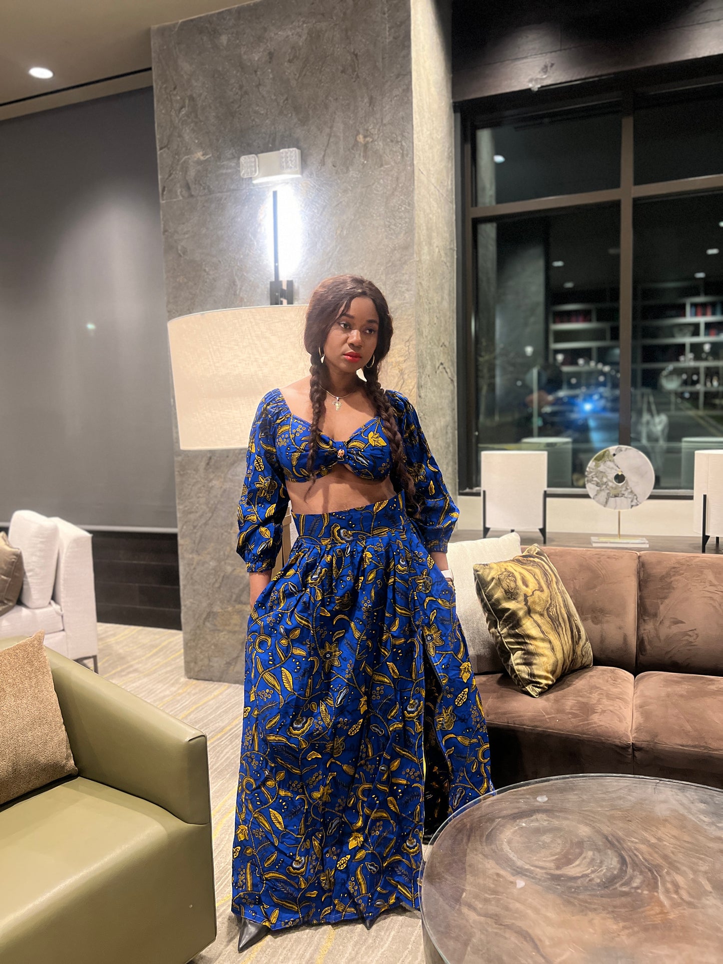 Malayka African printed Maxi Skirt 2 pieces. Skirt with zipper slit on the side, two side pockets and long sleeves crop top. For parties, weddings, birthdays, and major social events.