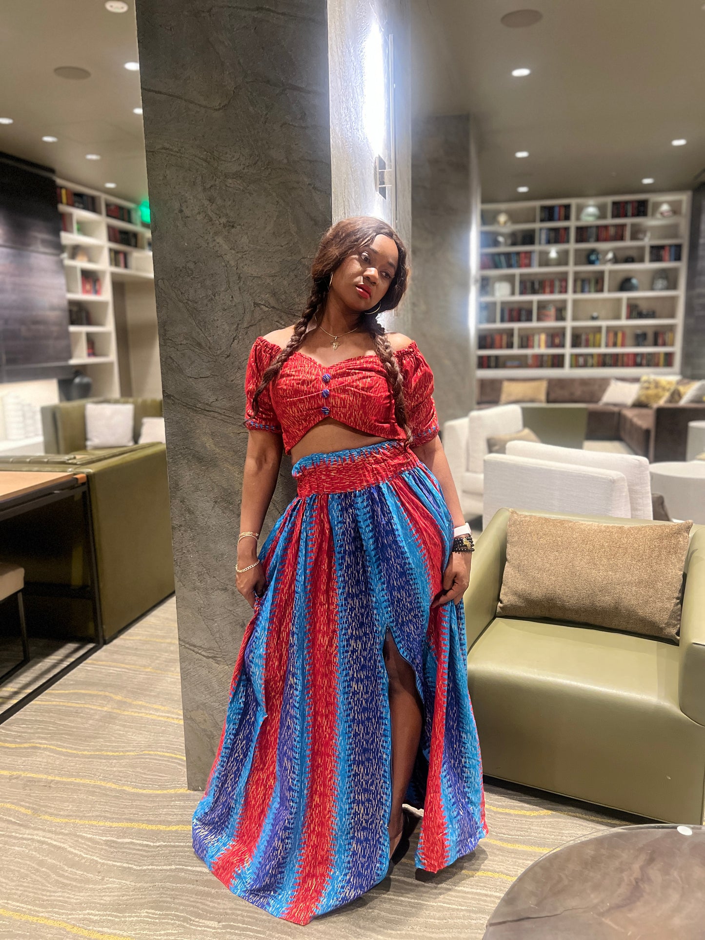 Malayka African printed Maxi Skirt 2 pieces. Skirt with zipper slit on the side, two side pockets and long sleeves crop top. For parties, weddings, birthdays, and major social events.
