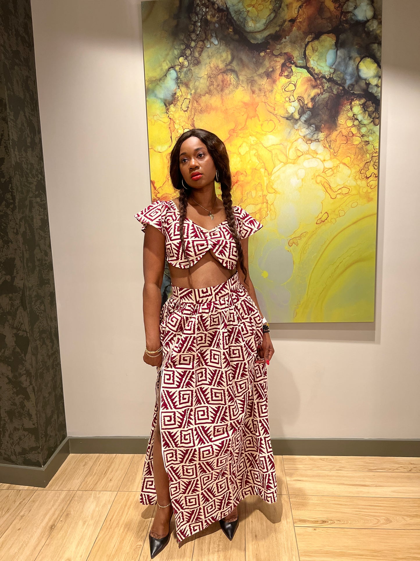 Malayka African printed Maxi Skirt 2 pieces. Skirt with zipper slit on the side, two side pockets and short sleeves crop top. For parties, weddings, birthdays, and major social events.
