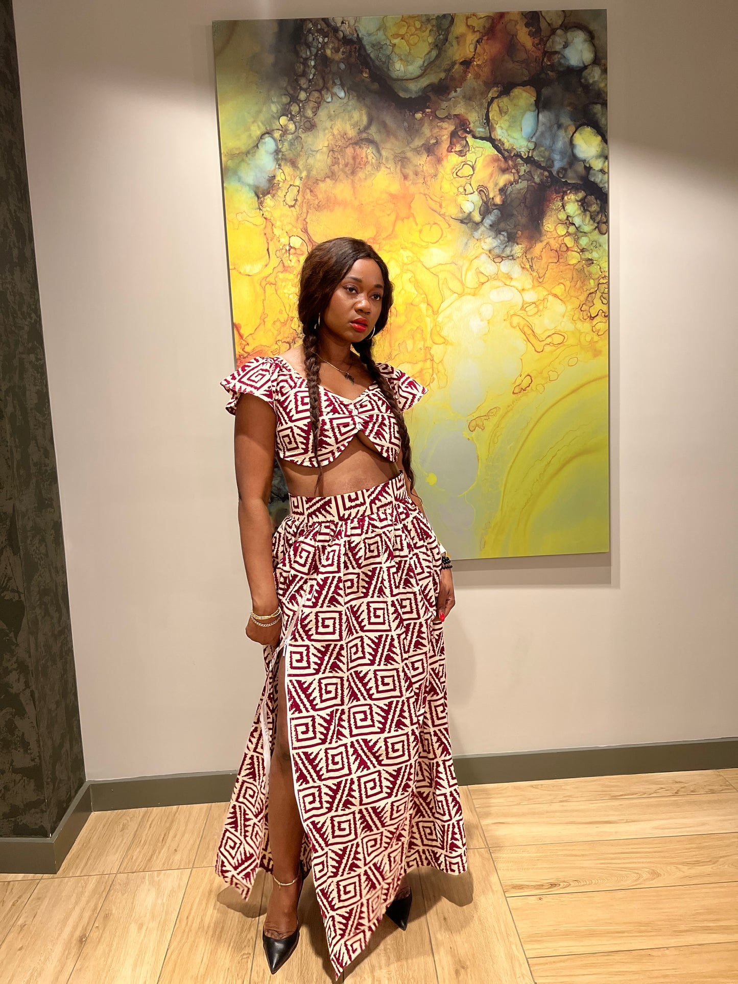 Malayka African printed Maxi Skirt 2 pieces. Skirt with zipper slit on the side, two side pockets and short sleeves crop top. For parties, weddings, birthdays, and major social events.