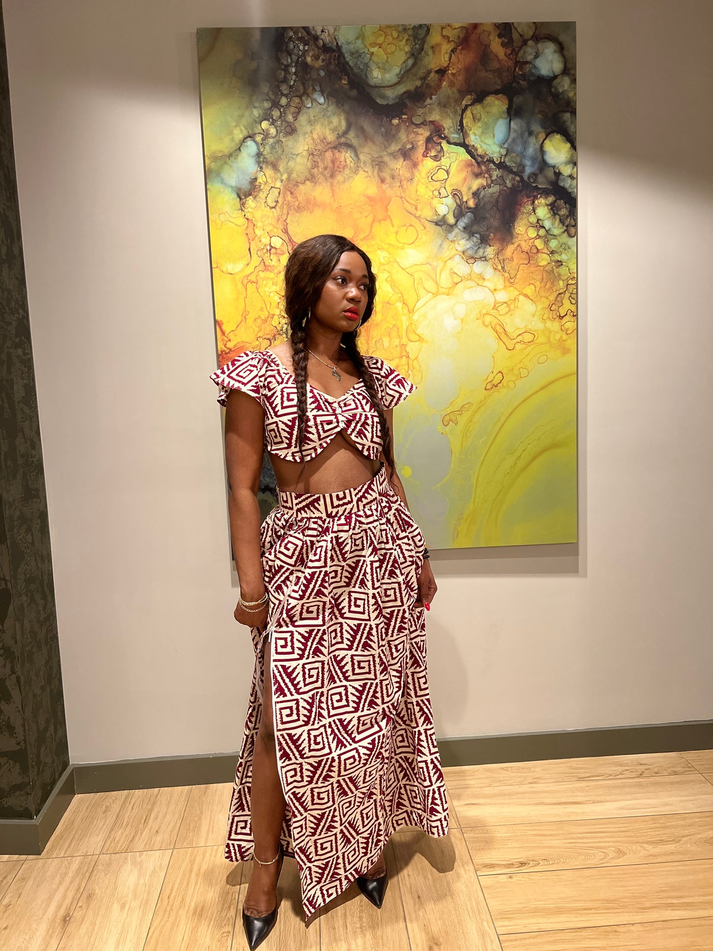 Malayka African printed Maxi Skirt 2 pieces. Skirt with zipper slit on the side, two side pockets and short sleeves crop top. For parties, weddings, birthdays, and major social events.