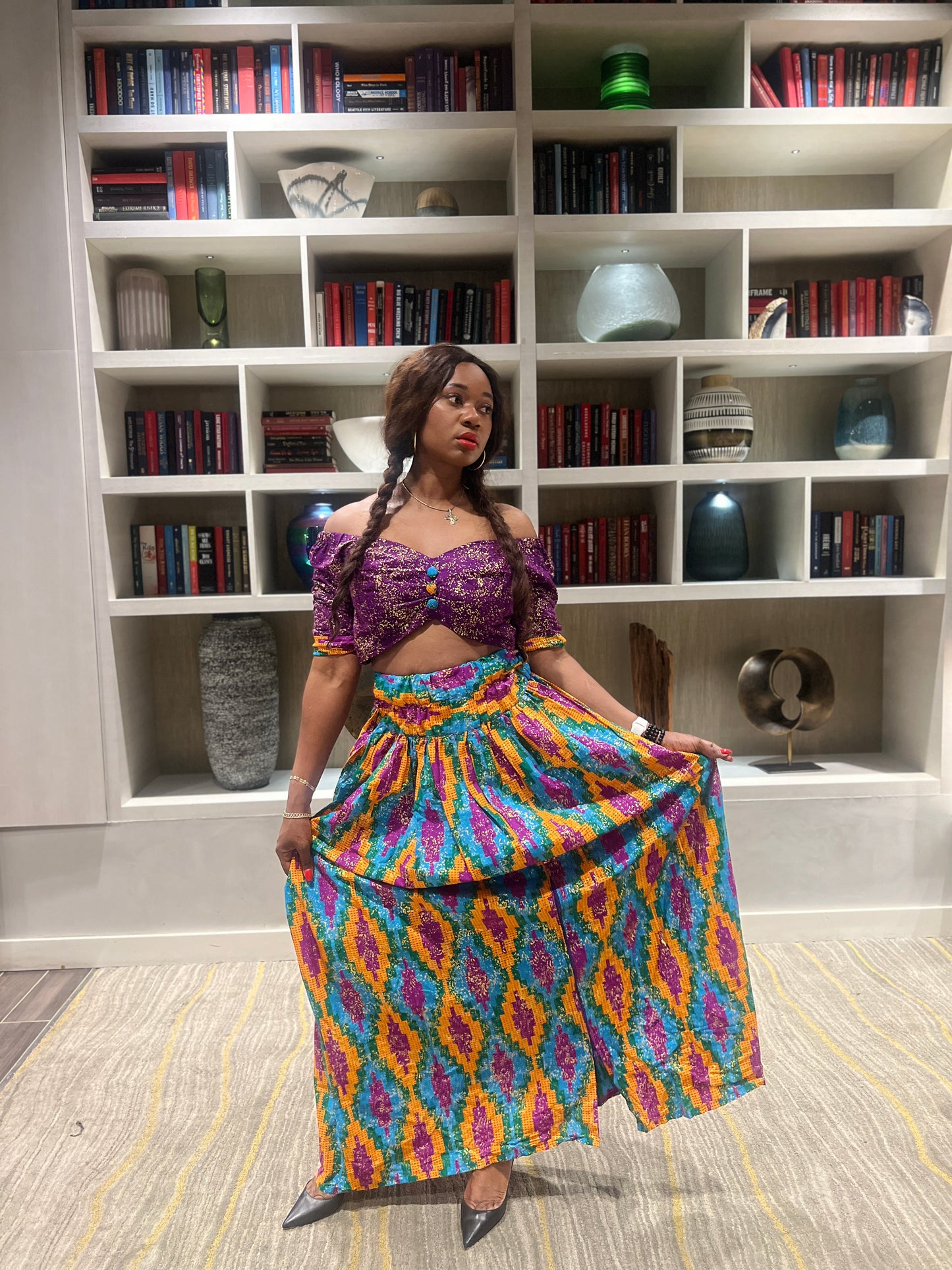 Malayka African printed Maxi Skirt 2 pieces. Skirt with zipper slit on the side, two side pockets and long sleeves crop top. For parties, weddings, birthdays, and major social events.