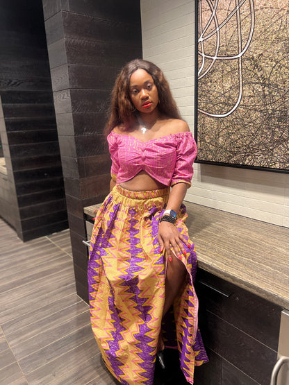 Malayka African printed  Maxi Skirt 2 pieces. Skirt with zipper slit on the side, two side pockets and long sleeves crop top. For parties, weddings, birthdays, and major social events.