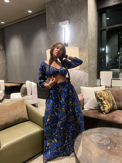 Malayka African printed  Maxi Skirt 2 pieces. Skirt with zipper slit on the side, two side pockets and long sleeves crop top. For parties, weddings, birthdays, and major social events.
