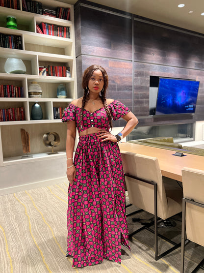 Malayka African printed  Maxi Skirt 2 pieces. Skirt with zipper slit on the side, two side pockets and short sleeves crop top. For parties, weddings, birthdays, and major social events.
