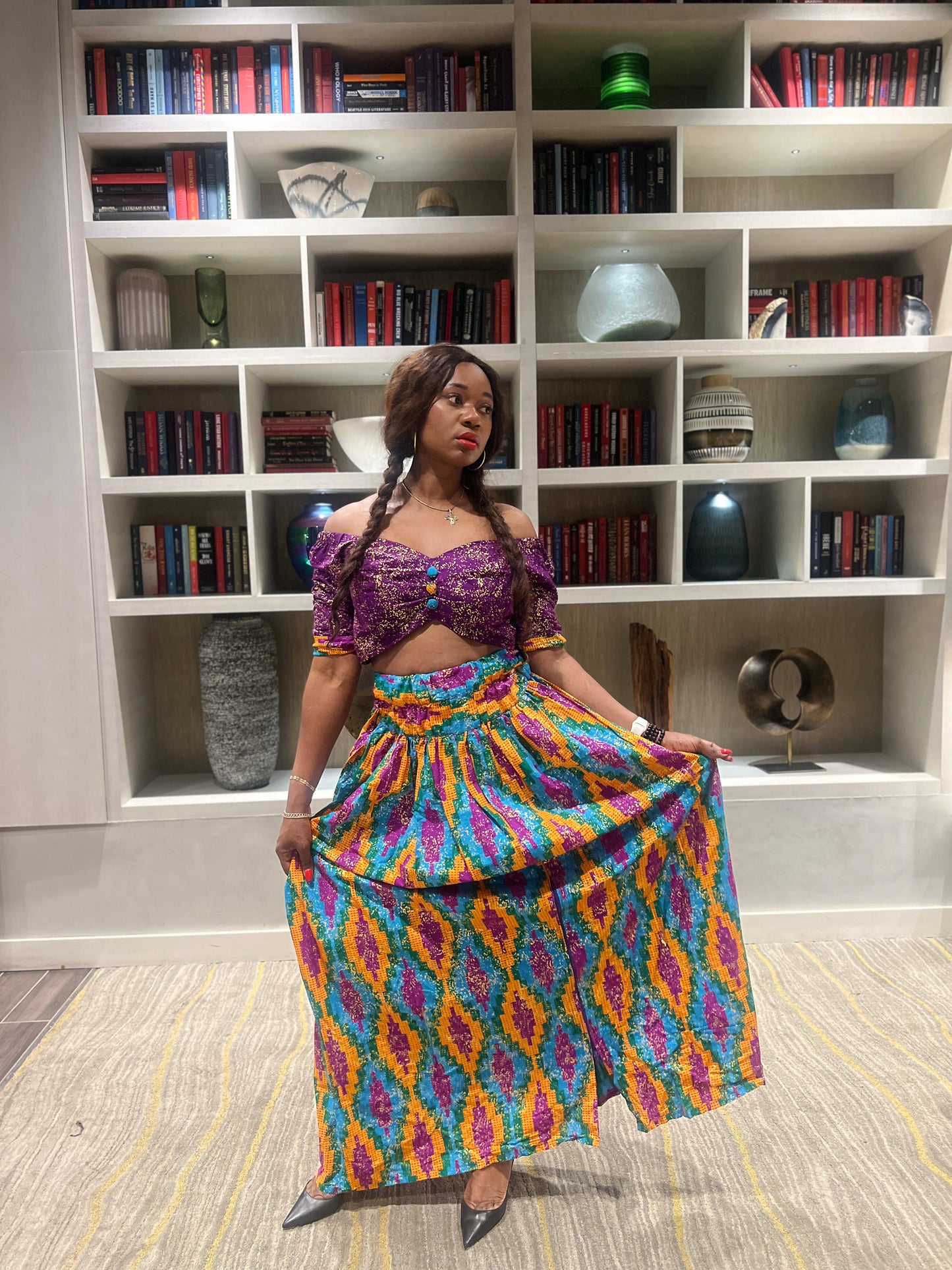 Malayka African printed  Maxi Skirt 2 pieces. Skirt with zipper slit on the side, two side pockets and long sleeves crop top. For parties, weddings, birthdays, and major social events.