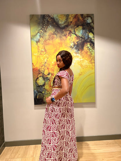 Malayka African printed  Maxi Skirt 2 pieces. Skirt with zipper slit on the side, two side pockets and short sleeves crop top. For parties, weddings, birthdays, and major social events.